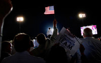 Gov. Mitt Romney takes the stage during a rally in Defiance, Ohio, for the Mitt Romney Presidential Campaign.