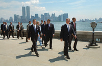 The World Trade Center Twin Towers dominate the New York skyline as President George W. Bush arrives at Ellis Island Tuesday, July 10, 2001, to deliver remarks at an Immigration and Naturalization Ceremony. 