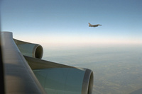 An F-16 escorts Air Force One Tuesday, Sept. 11, 2001, from Offutt Air Force Base in Nebraska to Andrews Air Force Base.