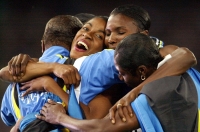 Bahamas women's 4 x 100 meter relay team celebrate winning the gold medal at the 2000 Summer Olympics in Sydney, Australia. 