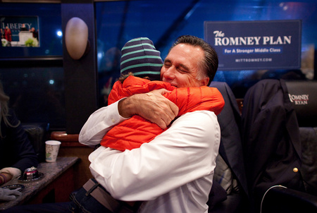 2012 presidential candidate Mitt Romney hugs his grandson during a bus tour in West Chester, Ohio.