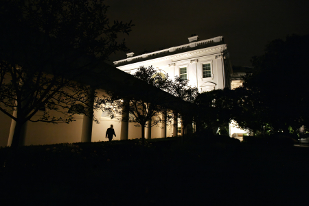 President George W. Bush walks back to the residence of the White House after delivering his national address to the nation about the terrorist attack on America. 