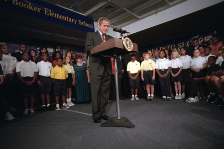 President George W. Bush leads a moment of silence before his statement about the attacks on the World Trade Center. 